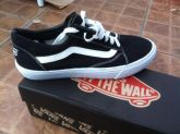 Vans "Off The Wall" Preto com Listra Branca